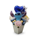 Stitch Azul con Chocolates y Corazón.
